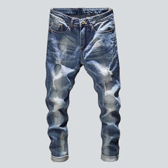 Light wash men ripped jeans