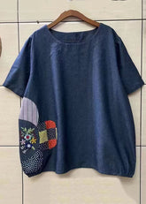 Lockeres, marineblaues T-Shirt aus Denim mit O-Ausschnitt und Stickerei im Patchwork-Stil
