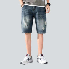 Lockere zerrissene Vintage-Jeansshorts