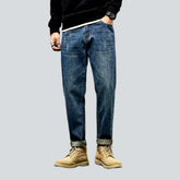 Mittelblaue Herrenjeans in Waschung