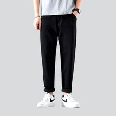 Vaqueros lavados a la piedra de cintura media para hombre