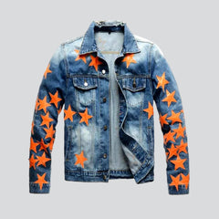 Vintage Jeansjacke mit orangenen Sternen