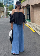 Pantalones anchos de mezclilla orgánica azul con bolsillos y cremallera