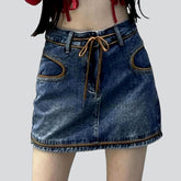 Mini-Jeansrock mit ovaler Tasche