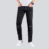 Zerrissene schwarze Jeans für Herren