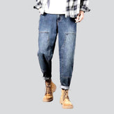 Carpenter Jeans mit geflickten Beinen für Herren