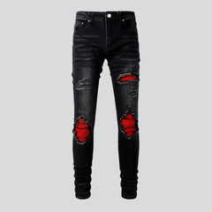 Vaqueros biker con parche rojo para hombre