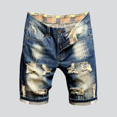 Blaue Distressed-Jeansshorts im Retro-Look