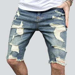 Retro skinny distressed denim shorts