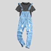 Zerrissener hellblauer Jeans-Jumpsuit