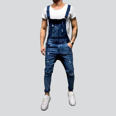 Mono vaquero ajustado y roto para hombre