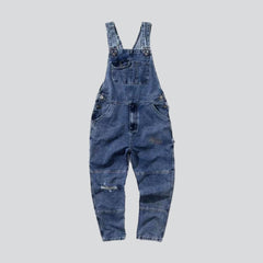 Jeans-Jumpsuit mit aufgesetzten Gesäßtaschen