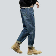 Vaqueros de hombre en azul lavado medio