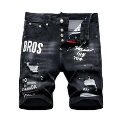 Black inscribed ripped denim shorts