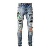 Vaqueros para hombre con bordado de cobra verde