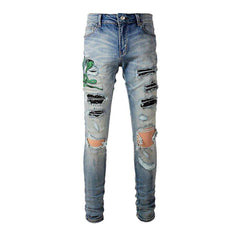 Vaqueros para hombre con bordado de cobra verde