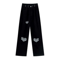 Vaqueros holgados negros con corazones pintados