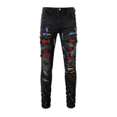 Vaqueros de hombre con parches de cristales rojos