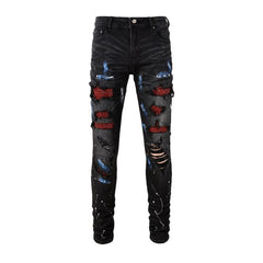 Vaqueros de hombre con parches de cristales rojos