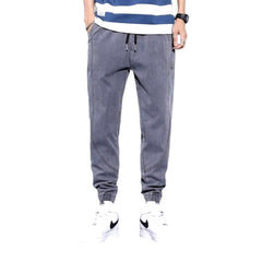 Pantalones deportivos de mezclilla de color liso para hombre