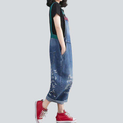 Denim jumpsuit with color suspenders