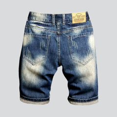 Retro blue distressed denim shorts