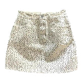 Falda vaquera rosa adornada de Rihnsotne