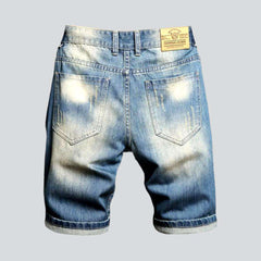 Light blue distressed denim shorts