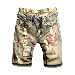 Zerrissene Jeansshorts mit Vintage-Stickerei