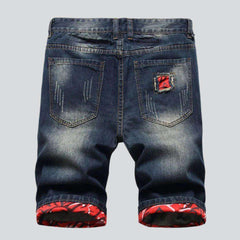 Dunkel gewaschene Distressed-Jeansshorts