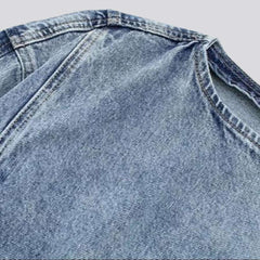 Chaqueta vaquera corta con cremallera asimétrica