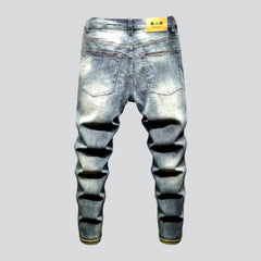 Trendy style distressed vintage jeans