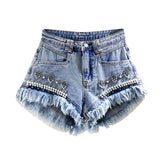 Distressed hem pearl denim shorts