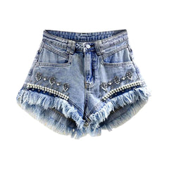 Jeansshorts mit Perlenbesatz und Used-Look