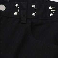 Vaqueros holgados negros con corazones pintados