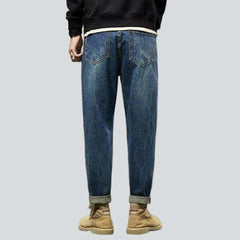 Vaqueros de hombre en azul lavado medio