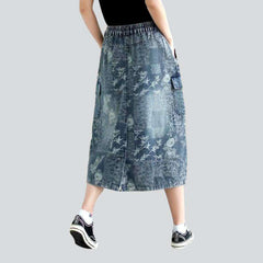 Falda vaquera con estampado floral cargo