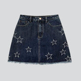 Dunkler Jeansrock mit Sternenstickerei