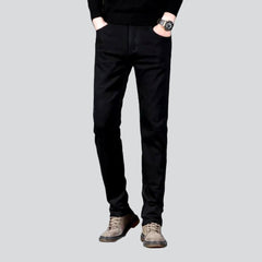 Vaqueros negros ajustados y elásticos para hombre