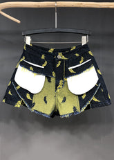 Stilvolle Jeansshorts mit Patchwork-Stickerei und Federn in Marineblau