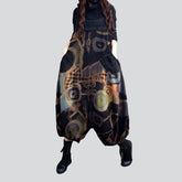 Schwarze Jeans-Latzhose mit trendigem Print