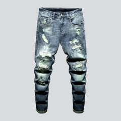 Trendy style distressed vintage jeans