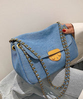 Bolso de mano tipo cartera de lona con cadena y patchwork azul denim