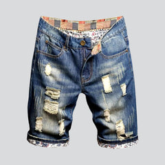 Vintage blue distressed denim shorts