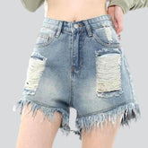 Zerrissene Jeansshorts für Damen mit weitem Bein
