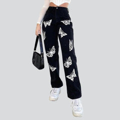 Women black jeans with butterflies