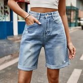 Shorts vaqueros desgastados con botones y bolsillos