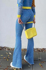 Vaqueros a rayas con dobladillo sin rematar