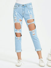Geknöpfte, verkürzte Jeans im Used-Look