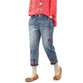 Mit Blumen bedruckte Damenjeans